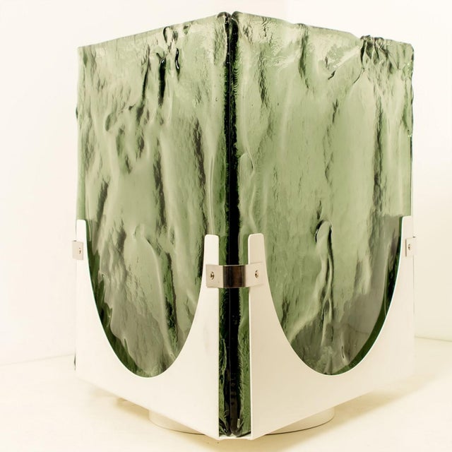 Wonderful high-end large triangle green glass table or floorlamp. Thick textured glass. From leucos, 1970. This triangle...