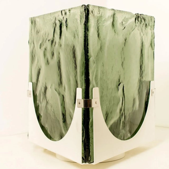 Wonderful high-end large triangle green glass table or floor lamp. Thick textured glass. From leucos, 1970. This triangle...
