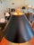 A table lamp featuring a polished brass urn accented by a slender column and classical handles. Inspired by Hellenic...