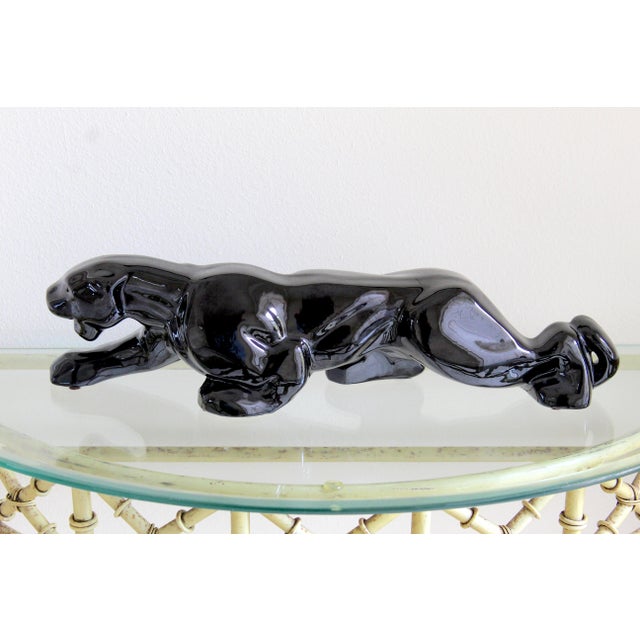 Bring classic Mid-Century style into your home with this vintage 1950s Black Panther TV Lamp Base, beautifully sculpted in...