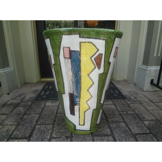 Italian Modernist Glazed Ceramic Umbrella Stand. This stunning Italian Modernist umbrella stand or vase was realized in...