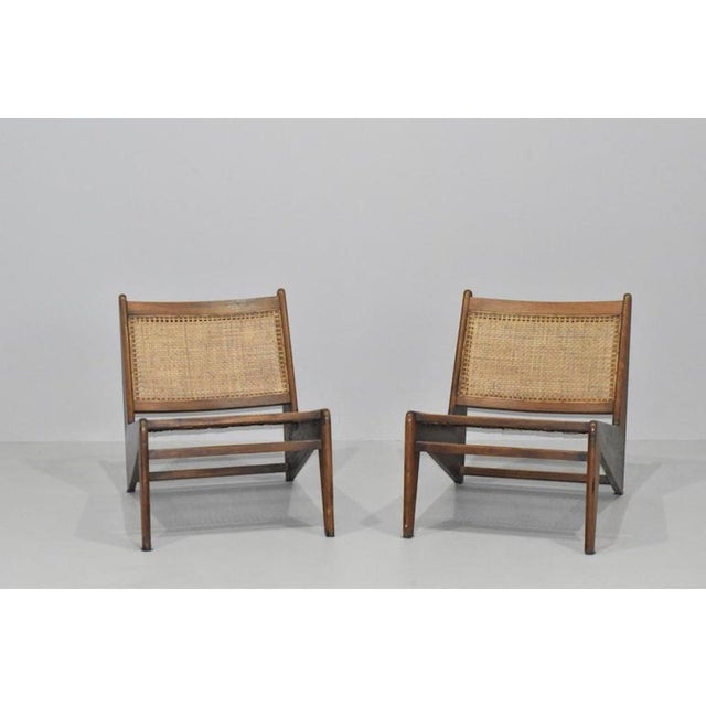 Armless armchair called "Kangaroo Chair," designed by Pierre Jeanneret for the Chandigarh project. Circa 1950s. Solid teak...