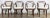Set of four antique bentwood dining chairs, each featuring rolled bentwood arms and rich natural wood stain. Three chairs...