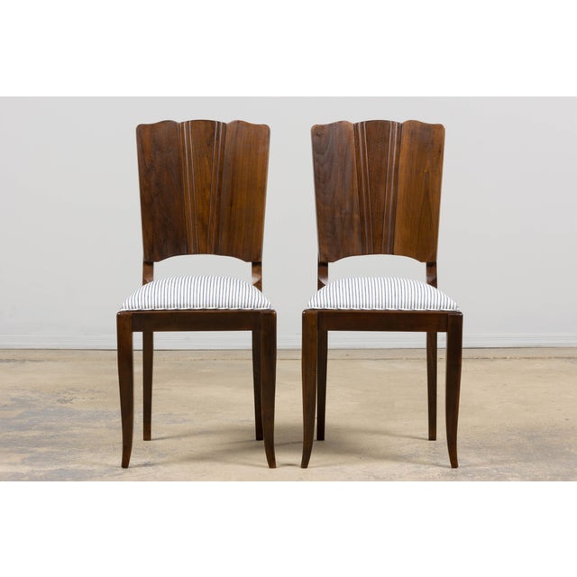 A refined set of six French Art Deco dining chairs sourced in Provence, dating to the late 1920s. The design is defined by...