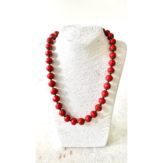 Rare Antique Cinnabar beaded necklace with an enamel inlay detail.