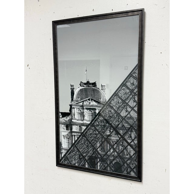Design Plus Gallery presents a Framed Print of the Lourve + its Pyramid by Philippe Hugonnard The iconic backdrop is a...
