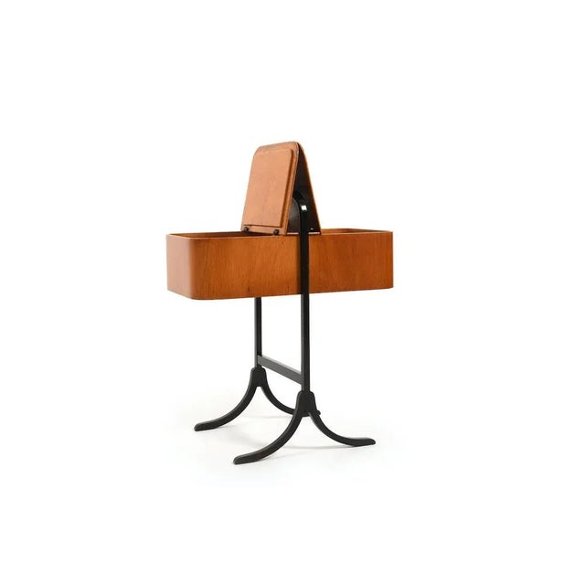 Rare and old Fritz Hansen sewing box. Designed by Søren Hansen 1933. Dark, almost black wood frame with beech sewing box....