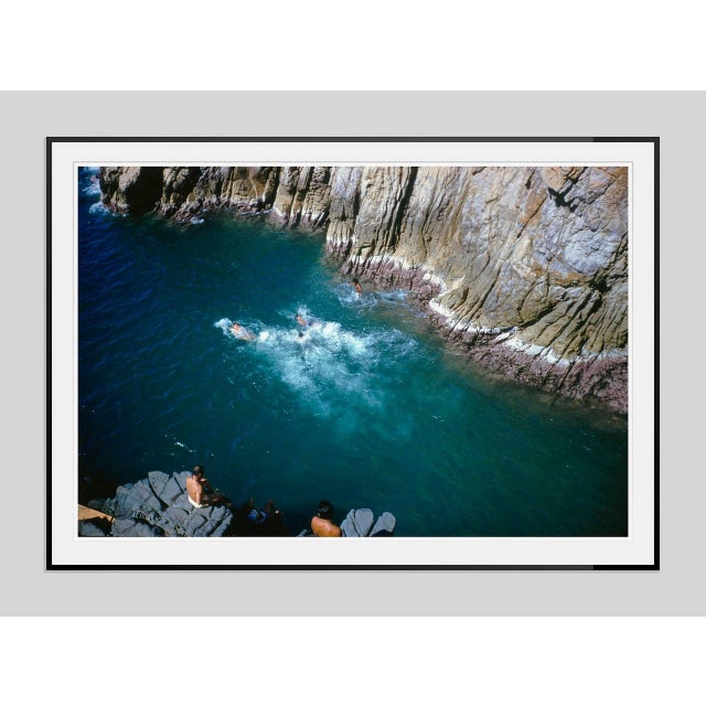 Cliff Diving At La Quebrada by Toni Frissell Thrill seekers cliff dive at La Quebrada in Acapulco, Mexico, 1960. (Toni...