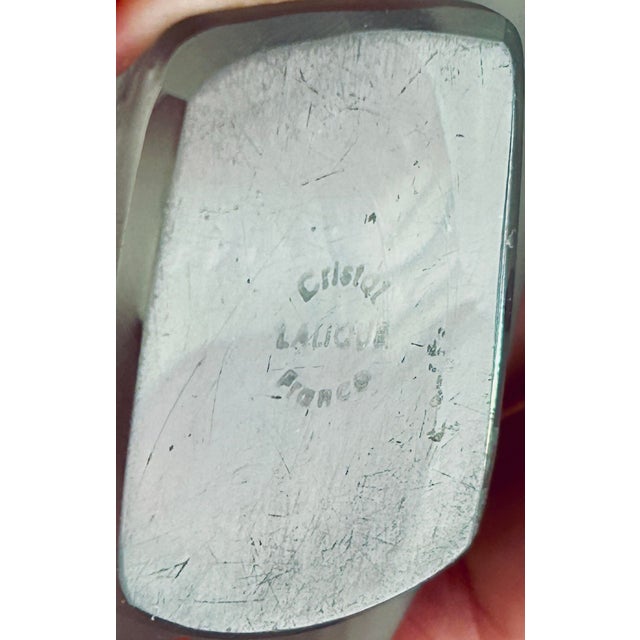 Pair of beautiful Lalique crystal figurines, featuring the iconic sparrow “Tête Penchée” (Head Tilted) and the other with...