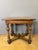 A writing table with one drawer, partly from the Louis XIII period, resting on four turned legs joined by X-shaped...