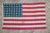 Early 20th C Cotton American Flag With Patina For Sale - Image 17 of 18