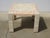 Square tabletop in two colors: ochre and pale pink. Inlaid with two distinct stones, with gilt brass inlays. Four angled...