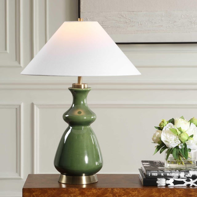 The Green Thumb Table Lamp Offers Both Versatility And Sophisticated Style. The Moss Green Ceramic Base Adds A Subtle Pop...