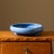 Dimensions: 12" W x 12" D x 3.25" H Description: A substantial 1920s Japanese Awaji art pottery low bowl featuring a...