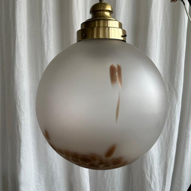 Beautiful Italian mid century globular frosted Murano glass pendant from the 1970s. Fine archetypal piece of handblown...