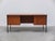 Timeless desk designed by Günter Renkel for REGO Möbel around 1960. Made of teak wood combined with black metal legs and...