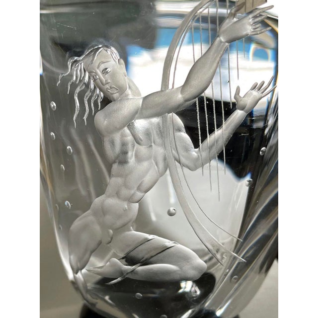 An especially brilliant example of the masterful engraving and high design of Vicke Lindstrand and the Orrefors glass...