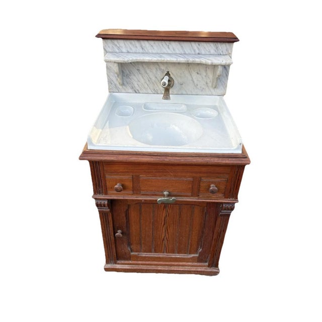 Beautiful and authentic French washstand dating from around 1900, crafted in solid pitch pine, featuring its original...