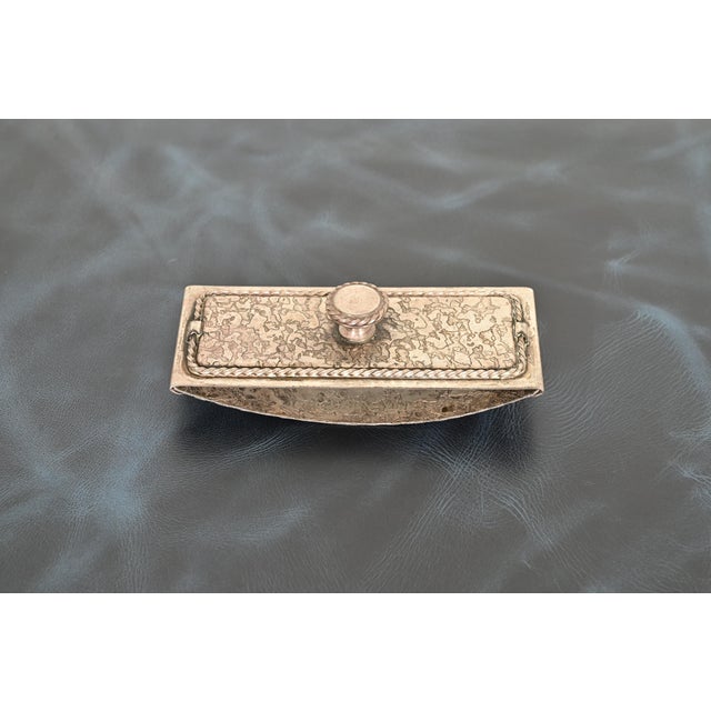 A gorgeous Arts & Crafts period acid silver finished hammered copper rocker ink blotter By Roycroft (signed with impressed...