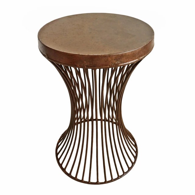 Vintage industrial rustic style aged rust finish iron hourglass shape side table with round top. Each will vary in aged...