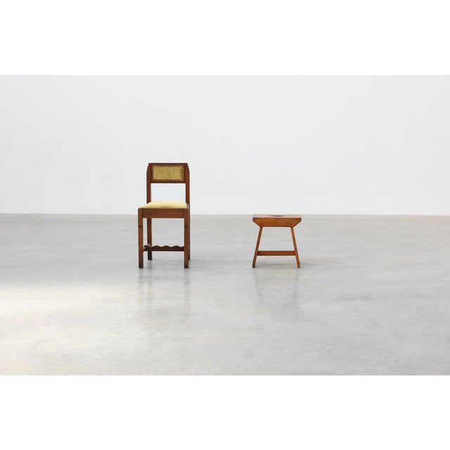 A charming Swedish rustic stool crafted in solid pine, dating from the early twentieth century. Defined by its simple yet...