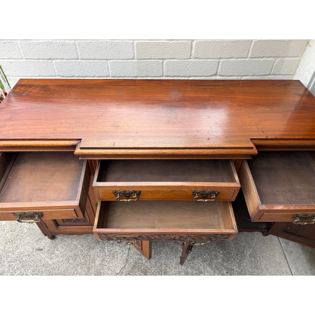 Antique Victorian Walnut Sideboard Featuring Intricate Hand Carvings and Original Ornate Brass Hardware For Sale - Image 11 of 12