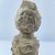 This Bakongo wooden figure from the Democratic Republic of Congo is a striking example of traditional power sculpture,...