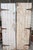 Stunning pair of authentic vintage solid wood barn doors. Both sides of the doors are different and incredibly gorgeous.