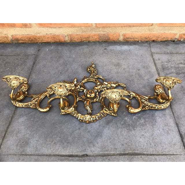 20th century French bronze wall-mounted coat rack four hangers.