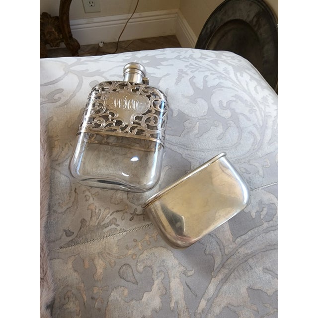 Stunning Antique American Sterling Silver flask with intricate silver overlay and beautiful old monogram on one side. This...