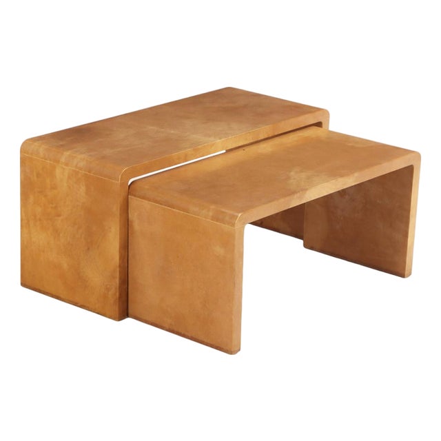 A Nesting Set of Two Parchment Coffee Tables in the Manner of Jean-Michel Frank For Sale