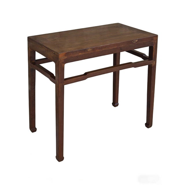 This solid wood side table features a classic square-corner construction with a flush-sided rectangular top. The frame is...