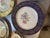 Hollywood Regency 1970s 22 Kt Filigree Deep Blue Plate Set With Floral Accents- Set of 17 For Sale - Image 3 of 8