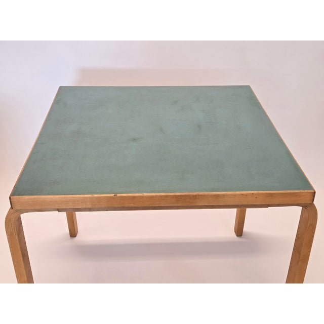 Artek 81C table, birch with turquoise linoleum. Designer Alvar Aalto. The table is from around the 1950s/60s. The table...