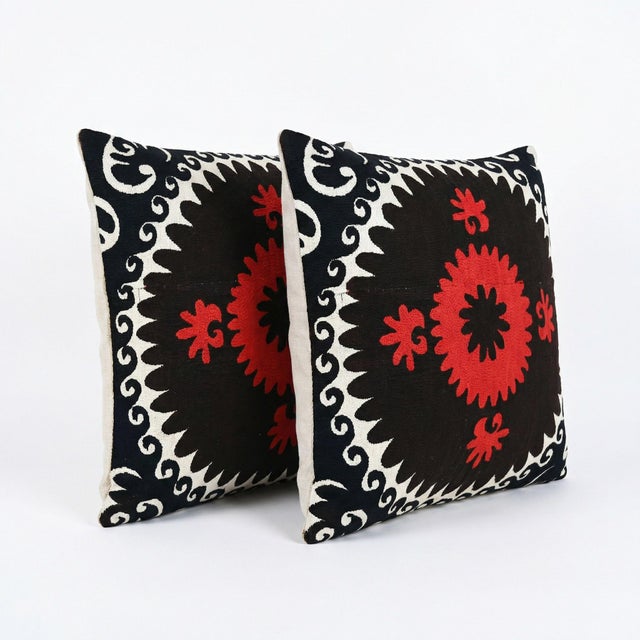 This beautiful 21'' x 22'' & 22'' x 22'' hand-embroidered Suzani pillow cover set was made from authentic Uzbek cotton...