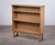A beautiful small oak bookcase from Denmark, dating from the 1970s and showcasing the bold character of the Brutalist...