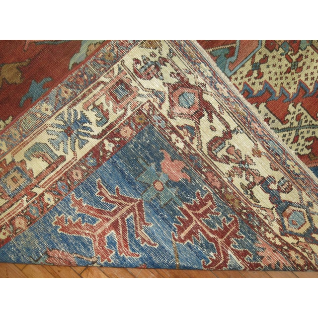 A late 19th century square room size Persian Bakshaish tribal Heriz carpet with a geometric design. Professionally Cleaned...