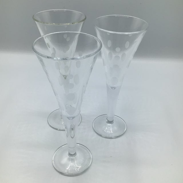 Set of 9 Mikasa etched cordial glasses with 4 5 different patterns.