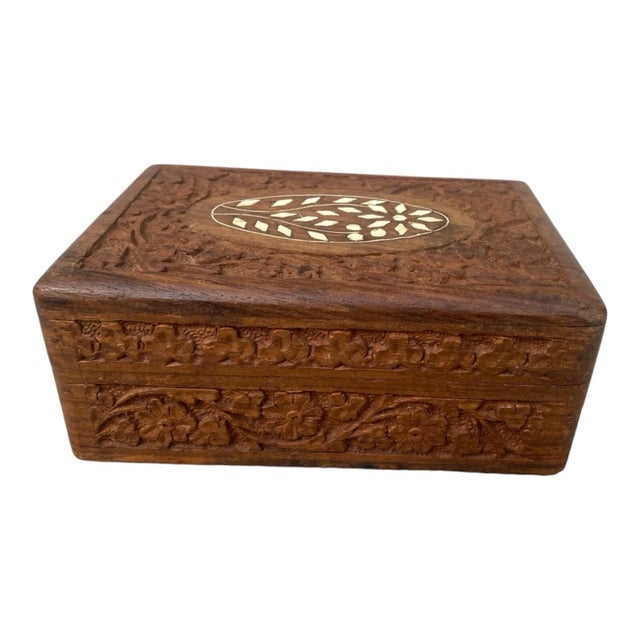 Beautifully handcrafted vintage-style jewelry box made of solid teakwood. Features intricate floral carvings and detailed...