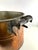 A substantial antique copper wash boiler dating to the late 19th century, retaining its original iron handle mounts and...