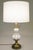 A sculpturally sensual White Opaline Art Glass and Brass table lamp designed and manufactured by Stiffel lighting circa...