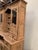 Two-part solid oak buffet Lower section with four doors and two drawers on the front Upper section with glass doors and a...