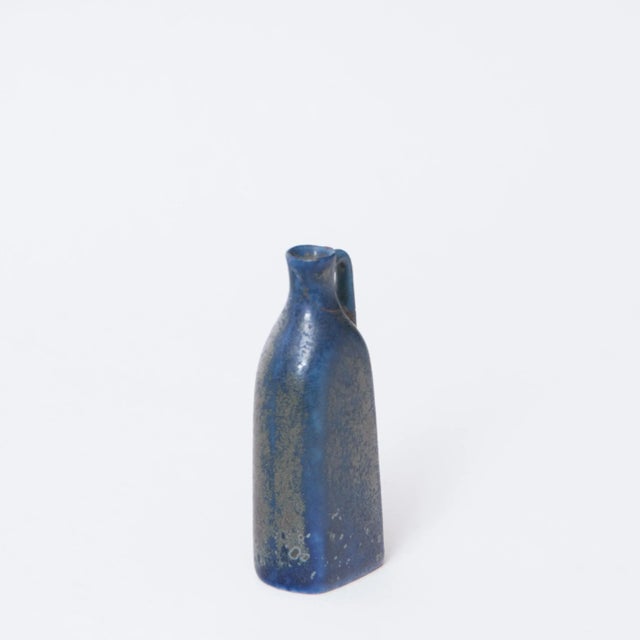 Miniature Blue Bottle Shaped Vase by Carl-Harry Stålhane, 1950s, in Good conditions. Designed 1950 to 1959 This piece has...