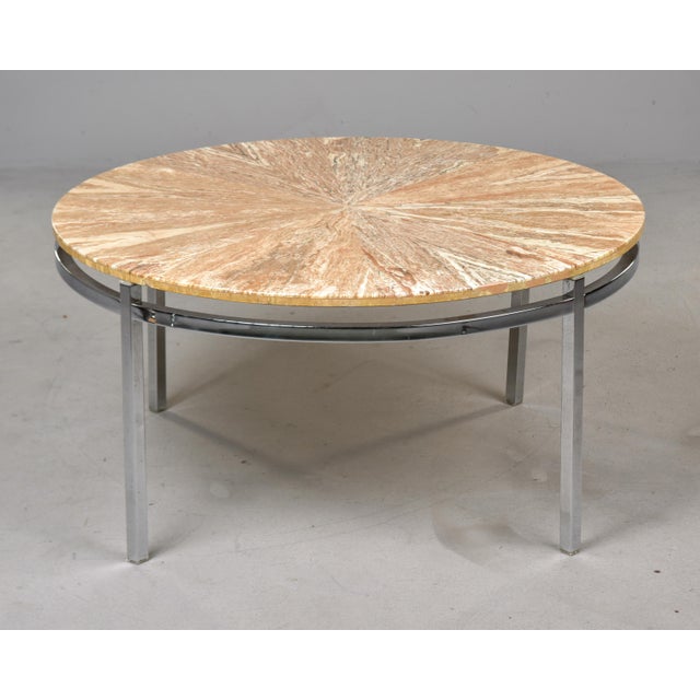 Found in England, this round marble topped coffee or cocktail table dates from the late 1970s / early 1980s. Polished...