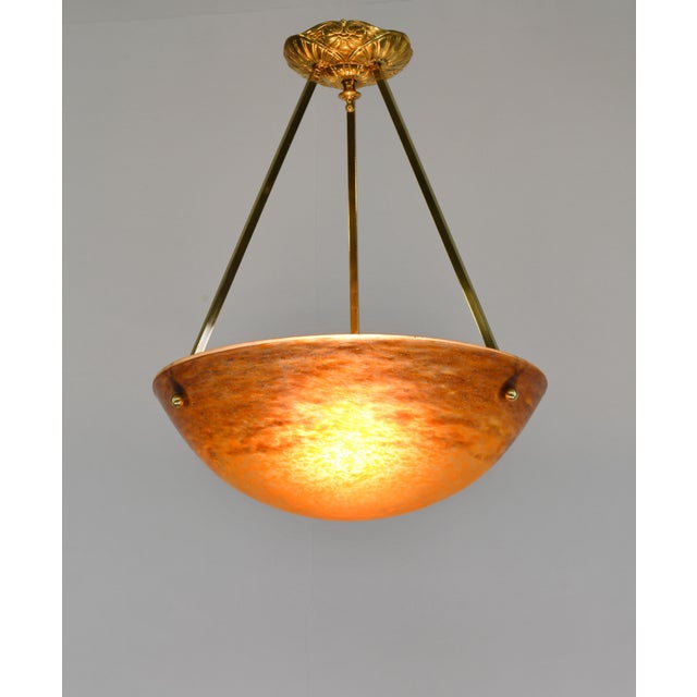 Muller frères Grandes Verreries de Croismare A beautiful 1925-1930 French art deco hanging fixture in solid brass holding...