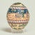 Transporting vintage Moroccan ostrich egg hand decorated with figures, animals and trees executed in classic Moorish style...
