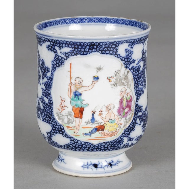 Very unusual Chinese Export famille rose baluster form mug raised on a pedestal base, decorated with a vivid scene of...