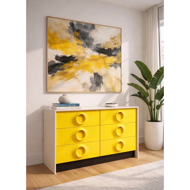 Extremely rare Mid Century Modern dresser in vibrant canary yellow, designed in the style of Raymond Loewy, c. 1960's....