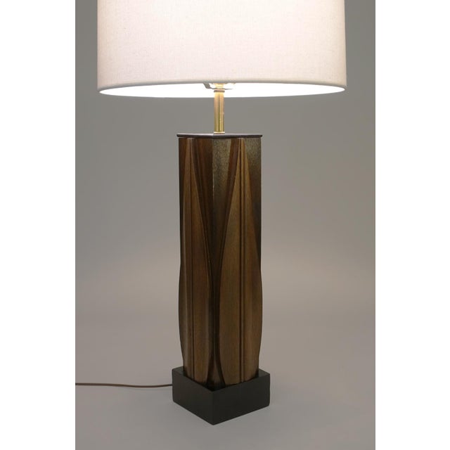 A minimal yet impressive Laurel Mid Century Modern solid carved Walnut "leaf column" table lamp designed and manufacture...