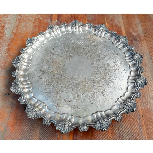 We are selling this high quality English Silverplate salver. This Rococo style salver is very finely modeled and designed...